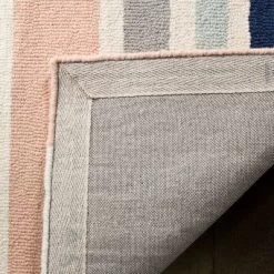 Safavieh Kids SFK916 Hand Tufted Area Rug - Safavieh -Children Furniture Store GUEST a577493b dd9e 401f a59f 3e299bb9e9f9