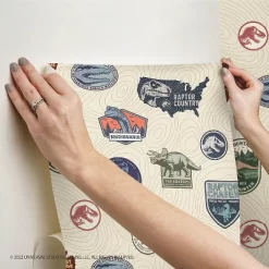 Jurassic World Badges Peel & Stick Wallpaper Beige - RoomMates -Children Furniture Store GUEST e405b9a5 b58f 40e0 b7d9 727072ebf4cc